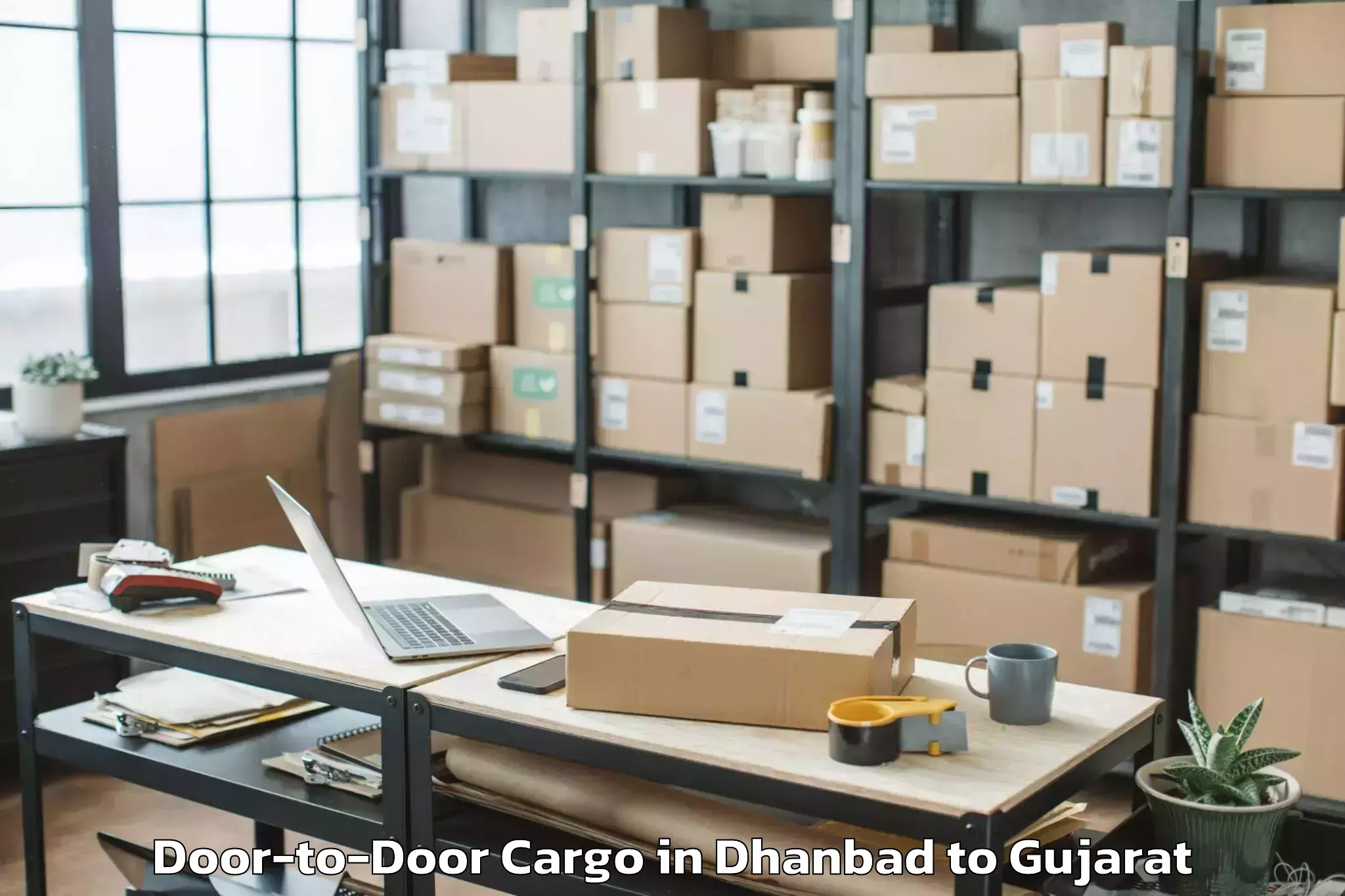 Book Your Dhanbad to Delvada Door To Door Cargo Today